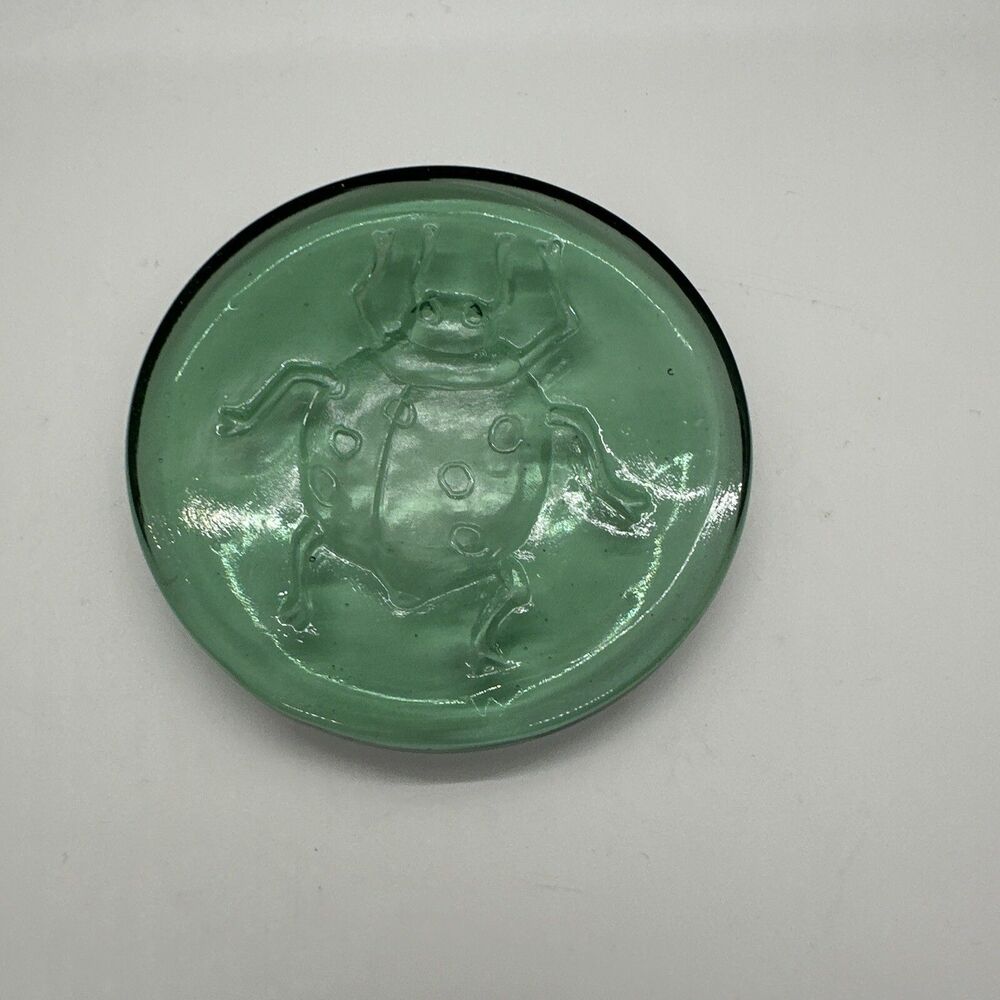 ART GLASS FLAT PAPERWEIGHT WITH BEETLE OR LADY BUG EMBOSSED (GREEN)